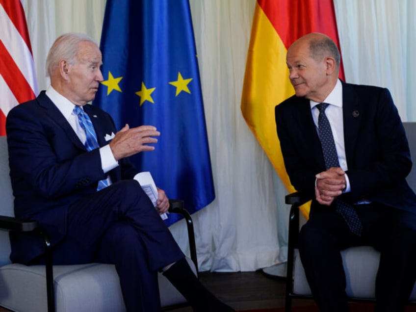 FILE - President Joe Biden and German Chancellor Olaf Scholz speak during a bilateral meet