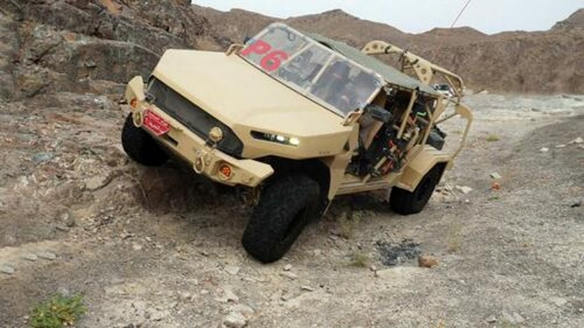 gm defenses new infantry squad vehicle passes grueling sand dune trials in uae