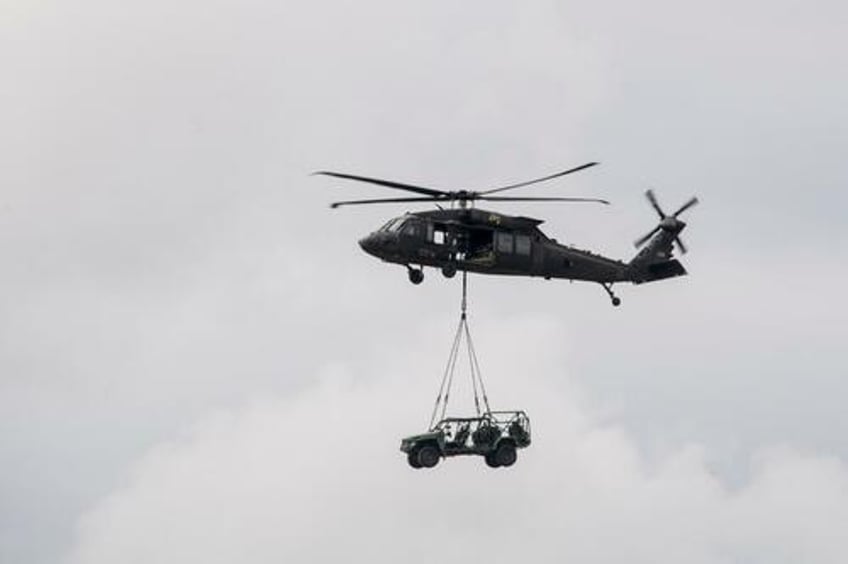 gm defenses new infantry squad vehicle passes grueling sand dune trials in uae