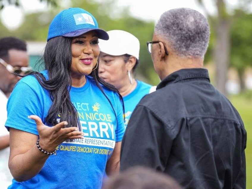 Texas State Rep. Shawn Thierry during a campaign event alongside over 50 African American