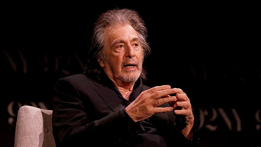 al pacino talks on a panel