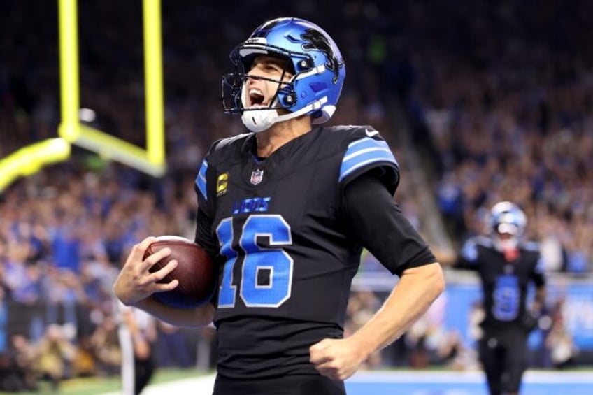 Detroit quarterback Jared Goff celebrates scoring a touchdown in the Lions win over Seattl