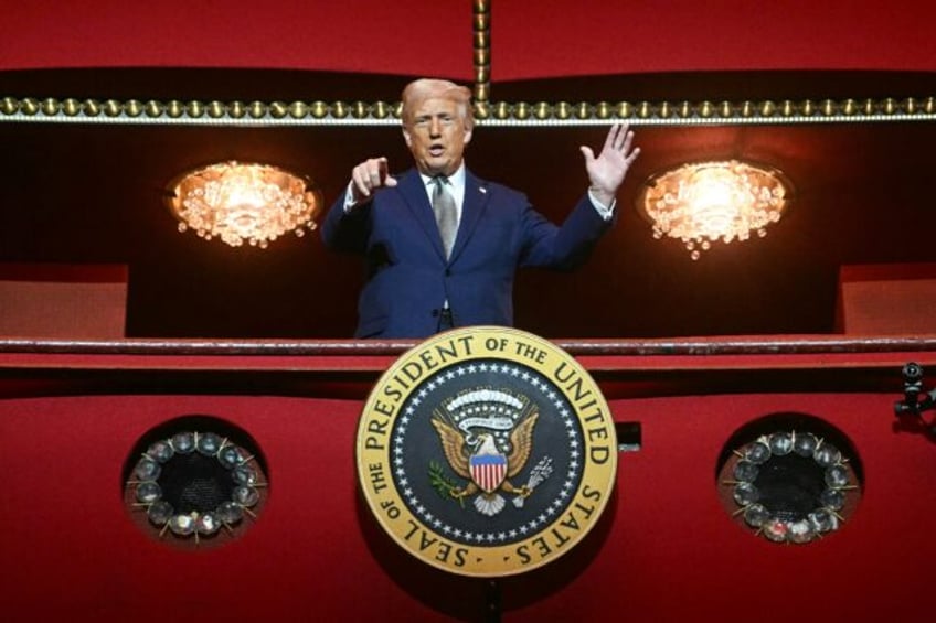 Donald Trump stands in the presidential box at the John F. Kennedy Center in Washington --