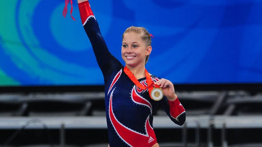 Shawn Johnson with gold medal