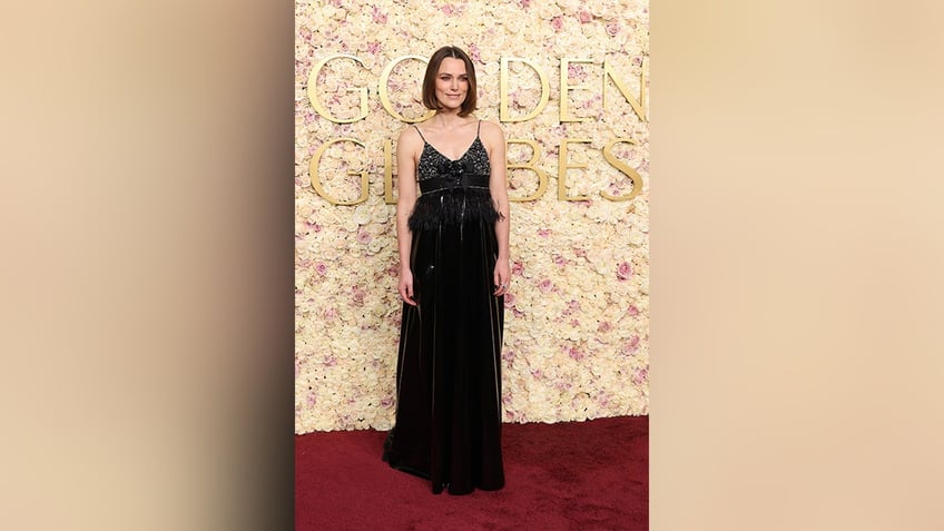 Keira Knightley wore a sleeveless black gown to the red carpet at the 2025 Golden Globe Awards.