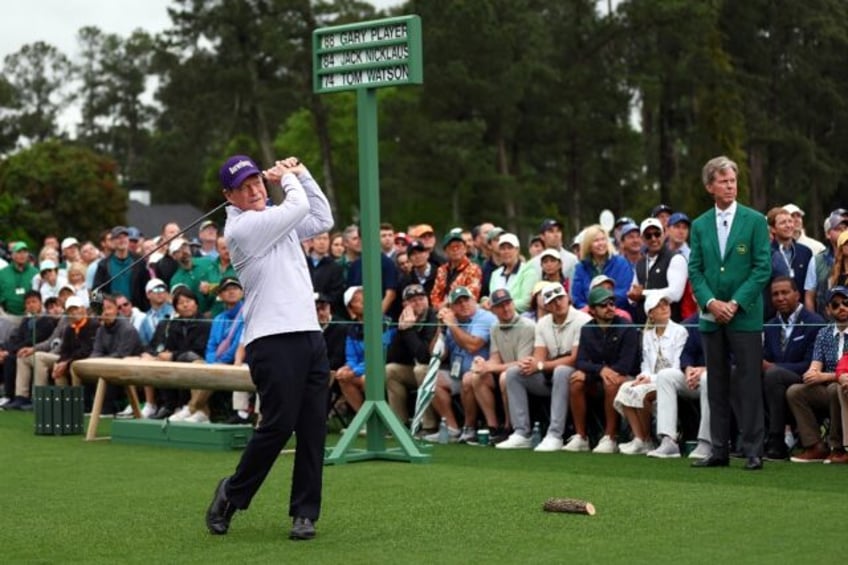 Former Masters champion Tom Watson plays his tee shot in the Honorary Starters ceremony as