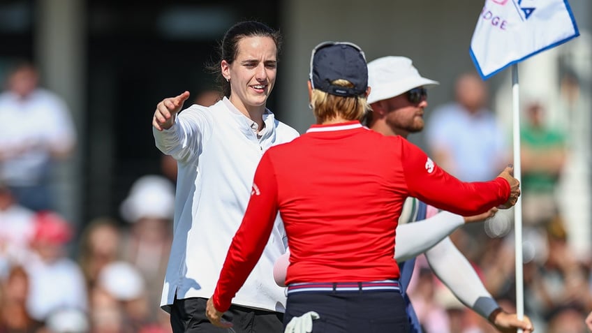Caitlin Clark greets Annika Sorenstam