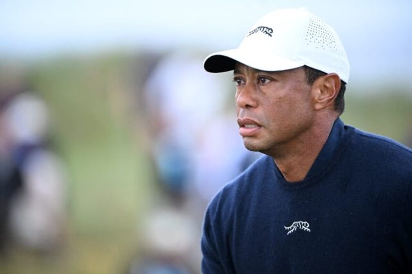 Tiger Woods posted his worst ever score at a British Open in missing the cut at 14 over pa