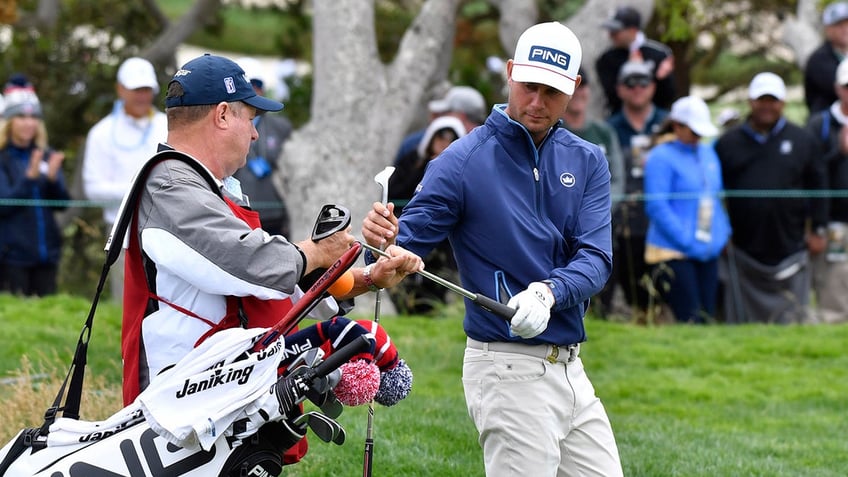 Harris English and caddie on green