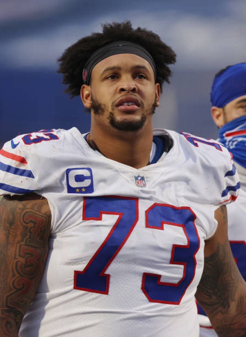 Dion Dawkins of the Buffalo Bills watches the end of the game against the Los Angeles Chargers at Bills Stadium on November 29, 2020 in Orchard Park,...