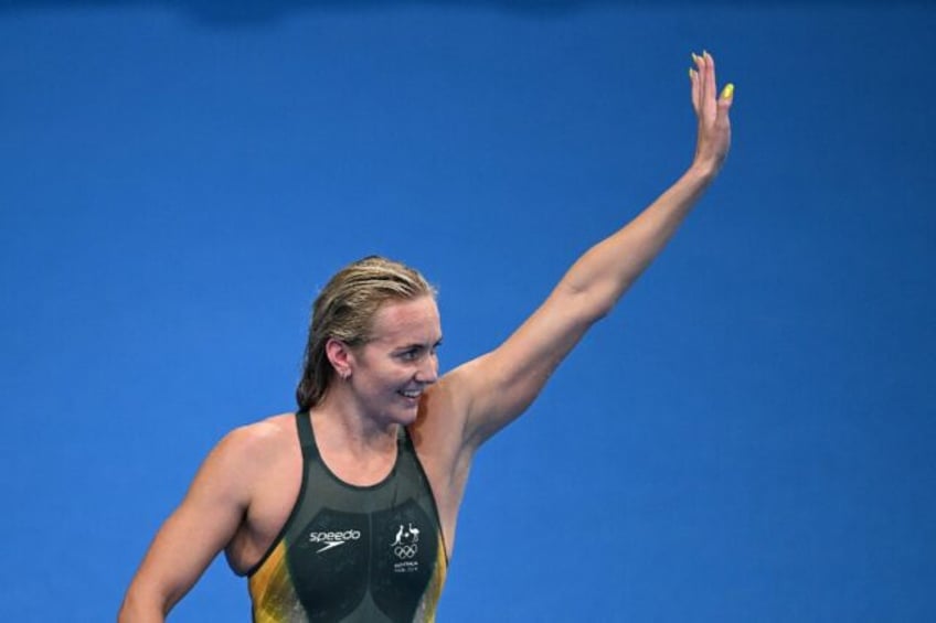 Australia's Ariarne Titmus celebrates after winning gold in the women's 400m freestyle at