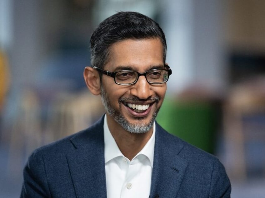 Google CEO Sundar Pichai flashes a big smile