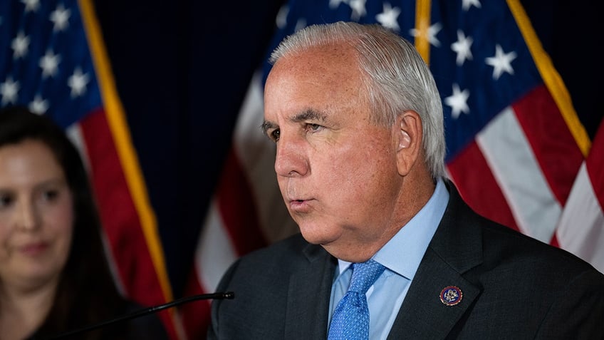 Rep. Carlos Gimenez addresses the media