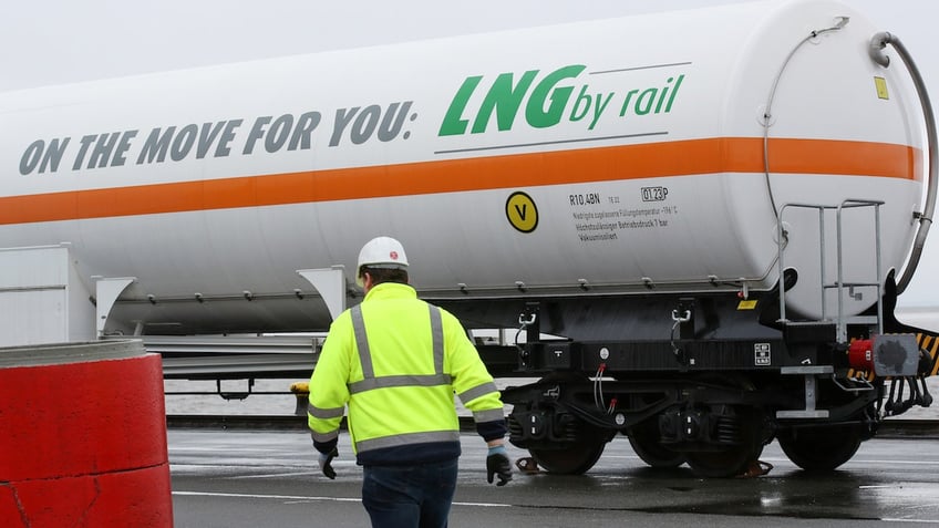 A tank car written with "On the move for you: LNG by rail" can be seen before loading at the Elbehafen port in Brunsbuettel, Germany, on April 25, 2016.