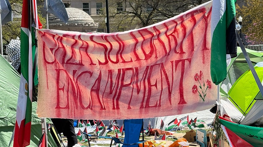 Anti-Israel protesters at Columbia University construct an encampment on campus.