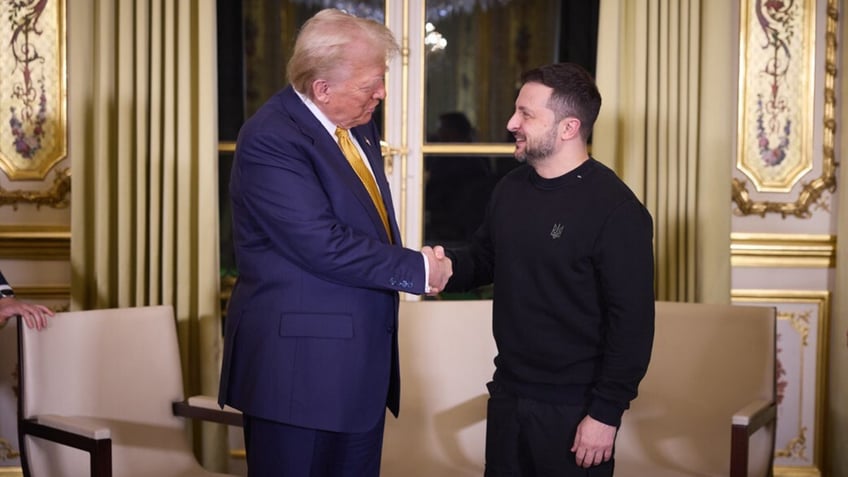 President Donald Trump shakes hands with Ukrainian leader Volodymyr Zelenskyy