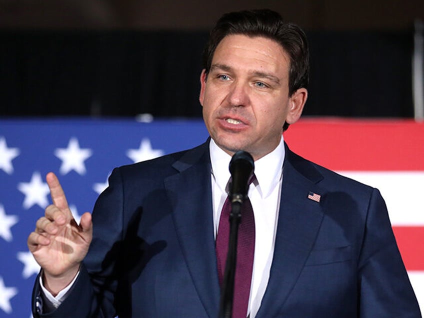 Governor Ron DeSantis speaking with supporters at a caucus night watch party at the Sherat