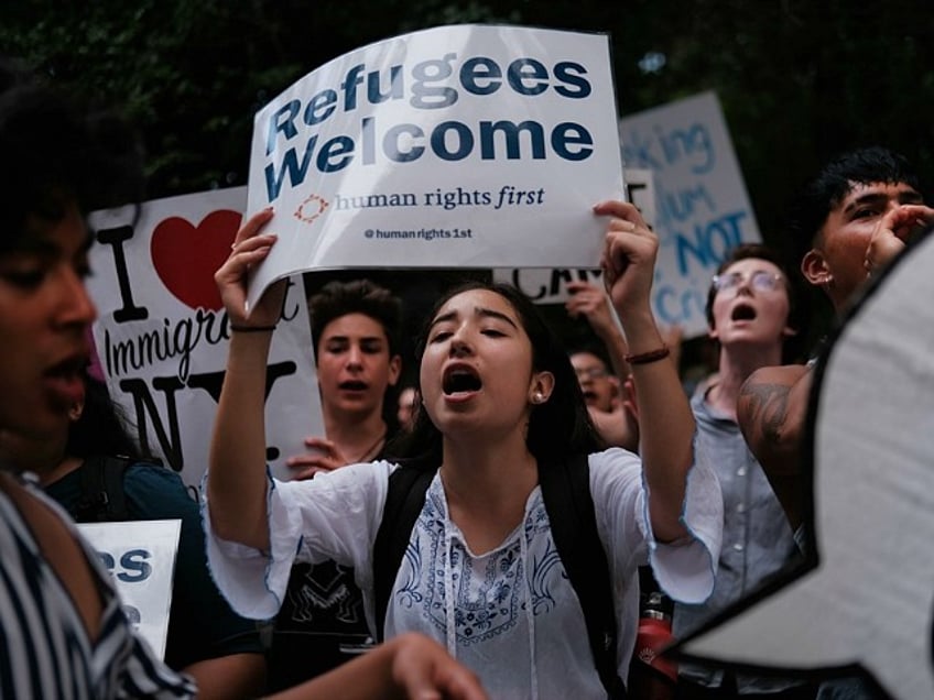 Hundreds of people gather in front of U.S. Senator Chuck Schumer's Brooklyn apartment to protest the migrant detention facilities on July 02, 2019 in New York City. Across the country tens of thousands of people are gathering for "Close the Camps' protests to voice their anger at the Trump administration's treatment of migrants at the U.S. and Mexican border. (Photo by Spencer Platt/Getty Images)