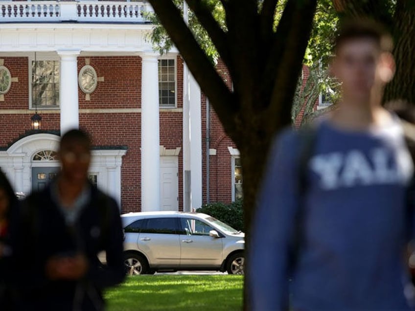 NEW HAVEN, CT - SEPTEMBER 27: Students walk through the campus of Yale University on the day the U.S. Senate Judiciary Committee was holding hearings for testimony from Dr. Christine Blasey Ford and Supreme Court nominee Brett Kavanaugh September 27, 2018 in New Haven, Connecticut. Blasey Ford, a professor at …