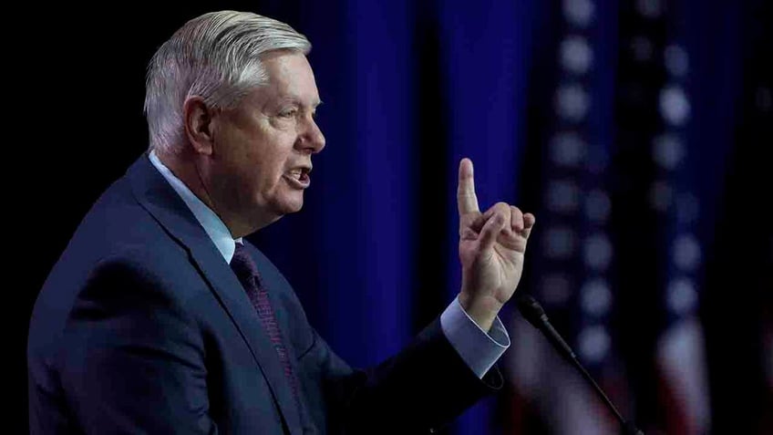 graham dismisses liz cheneys trump warning says world will be truly on fire if biden re elected