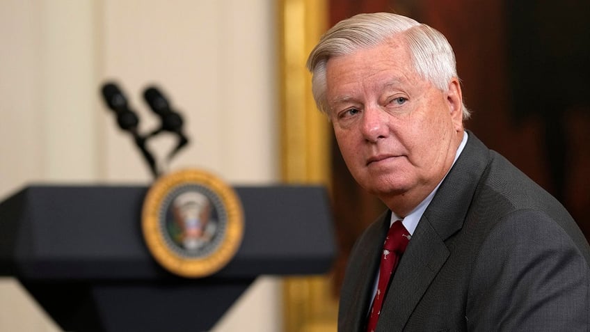 Lindsey Graham with white house lectern in background