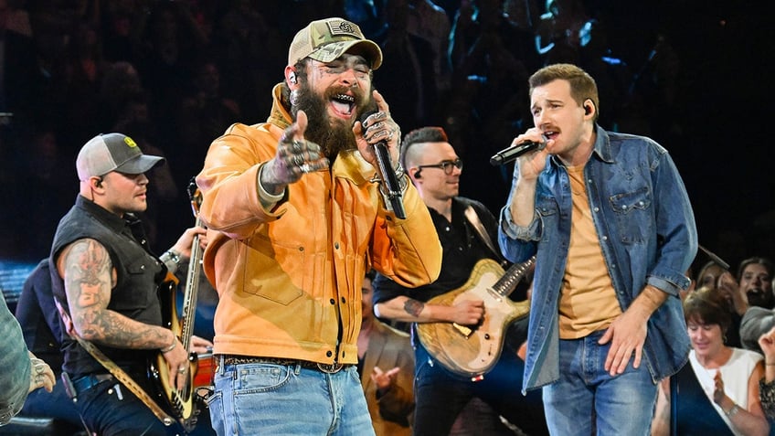 Post Malone and Morgan Wallen perform onstage