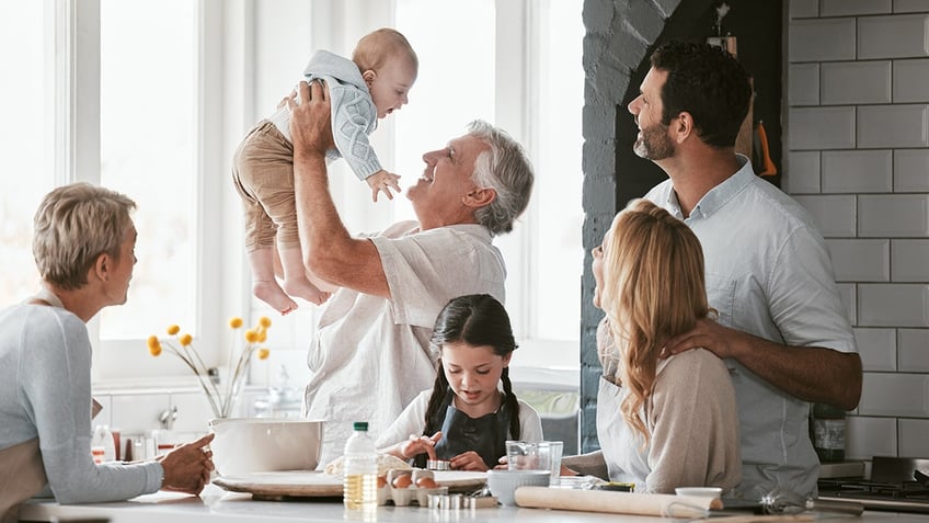 family with kids in a kitchen