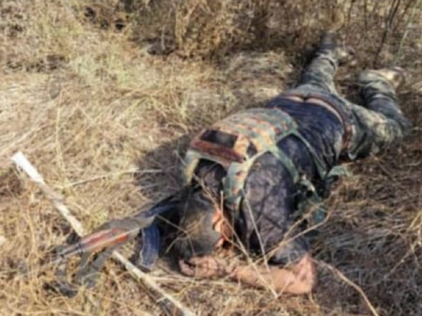 graphic cartel gunmen behead rivals as government officials claim crime dramatically lower