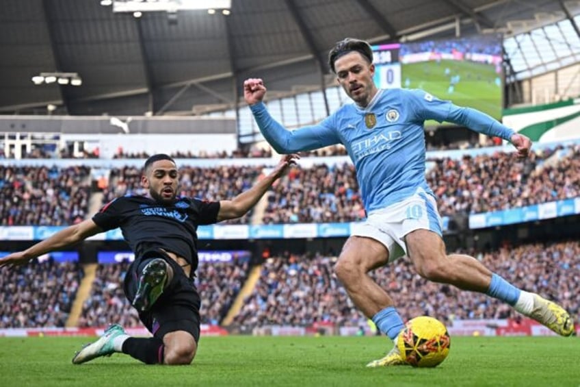 Jack Grealish (right) returned to the Manchester City starting line-up for Tuesday's clash