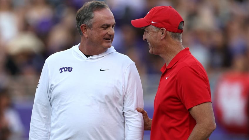 TCU head coach Sonny Dykes and Houston head coach Willie Fritz meet on the field before the game at Amon G. Carter Stadium. (Photo by Ron Jenkins/Getty Images)