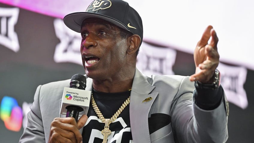 Colorado coach Deion Sanders talks during a coaches roundtable at Big 12 Media Days. (Photo by Austin McAfee/Icon Sportswire via Getty Images)