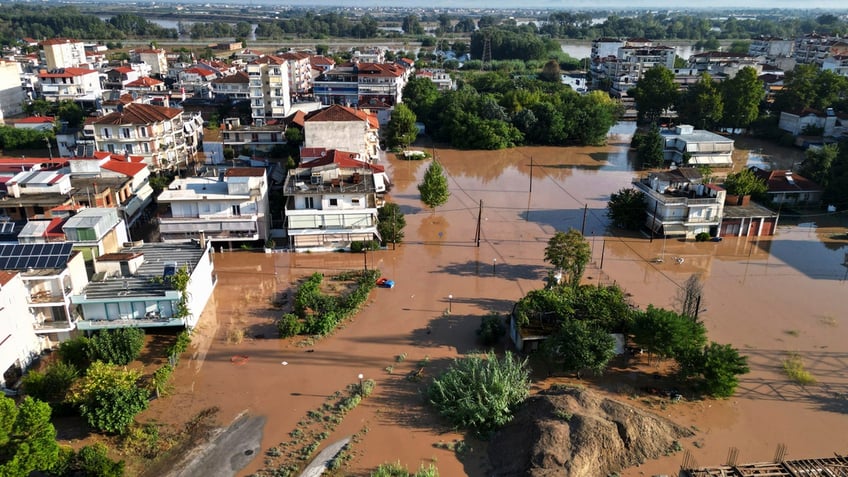 greek floods now believed to have killed 10 4 still missing