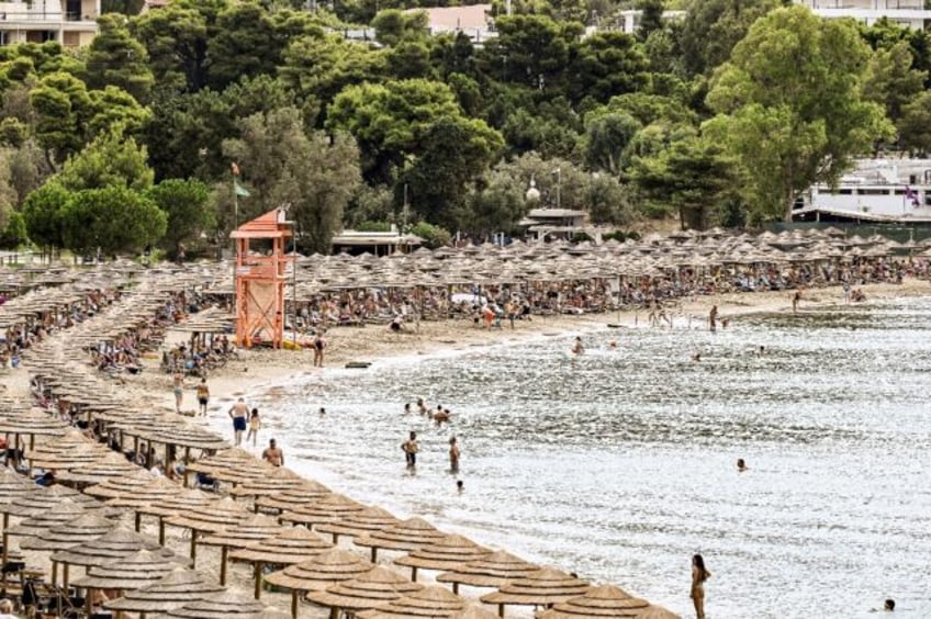 greek islanders refuse to throw in the towel over sunloungers