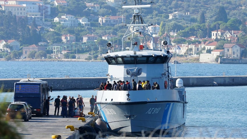 greek rescue operations underway for 2 vessels crammed with dozens of migrants