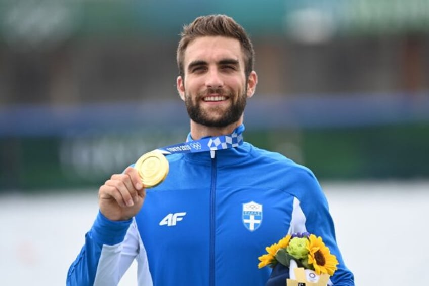 greek rowing champion ntouskos to start olympic torch relay