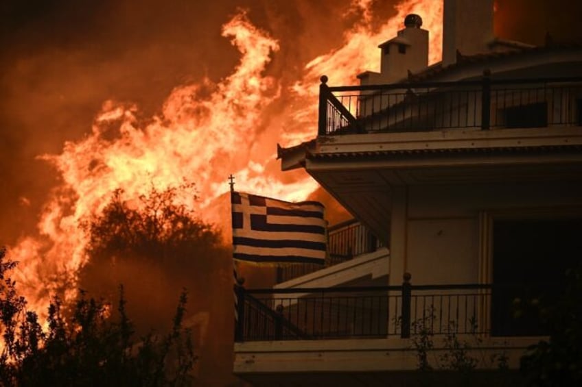 greek wildfires spur anti migrant sentiment