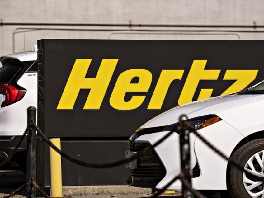 Cars on a Hertz car rental lot in Berkeley, California, U.S., on Wednesday, Oct. 27, 2021. Hertz Global Holdings Inc., fresh off a blockbuster order for 100,000 Teslas, reached an exclusive agreement to supply Uber drivers with electric vehicles and signed up Carvana Co. to dispose of rental cars it …