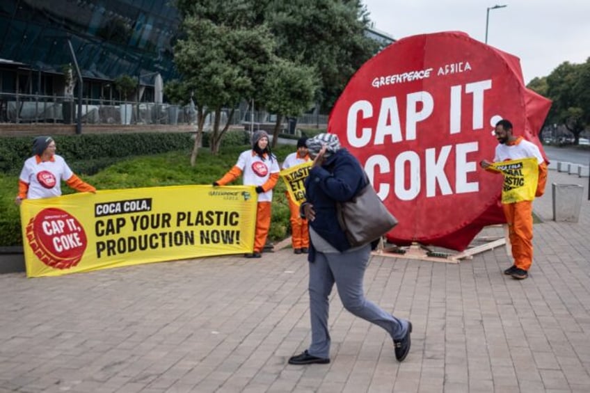 greenpeace slams coca cola for producing billions of plastic bottles