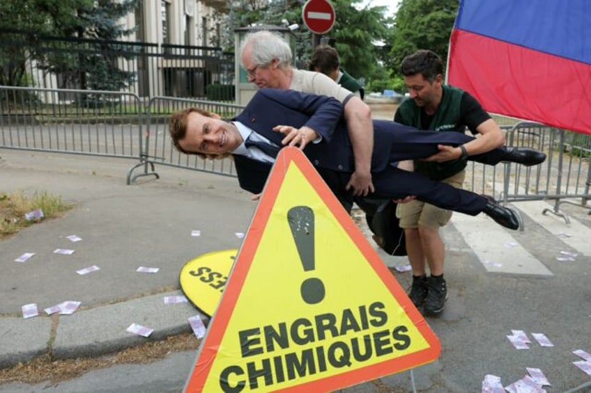 Greenpeace activists made away with a wax figure of French President Emmanuel Macron, whic