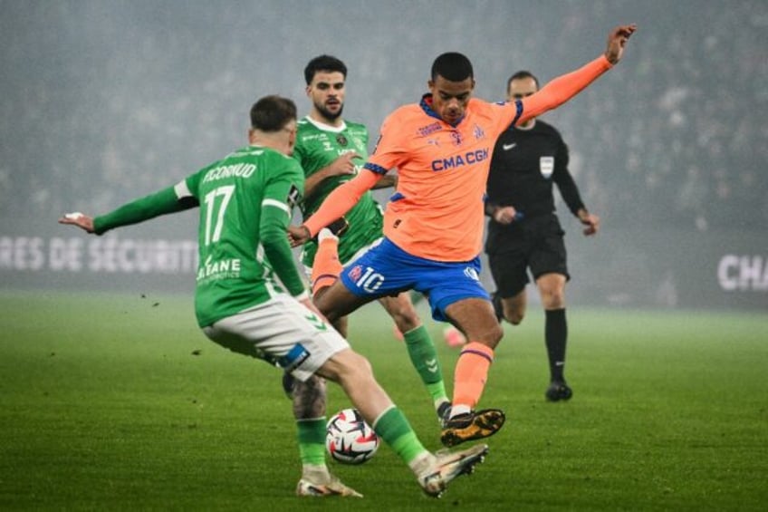 Marseille's Mason Greenwood (R) in action during his team's 2-0 win at Saint-Etienne in Li