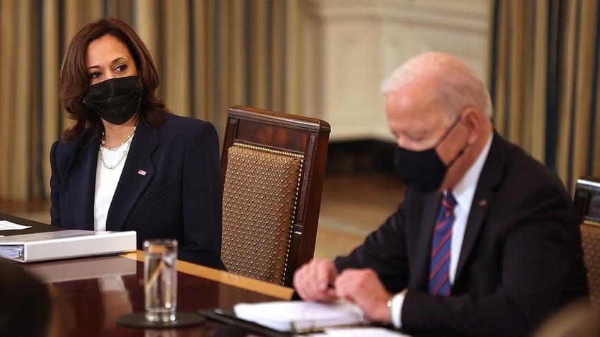 WASHINGTON, DC - MARCH 24: U.S. Vice President Kamala Harris (L) and President Joe Biden meet with cabinet members and immigration advisors in the State Dining Room on March 24, 2021 in Washington, DC. With the number of migrants apprehended at the U.S.-Mexico border reaching a two-decade high, Biden announced that Harris will be leading the White House efforts to handle the crisis at the border. (Photo by Chip Somodevilla/Getty Images)