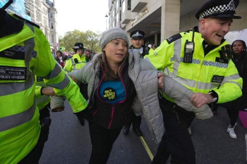 greta thunberg was among climate activists detained at a protest to disrupt oil executives forum