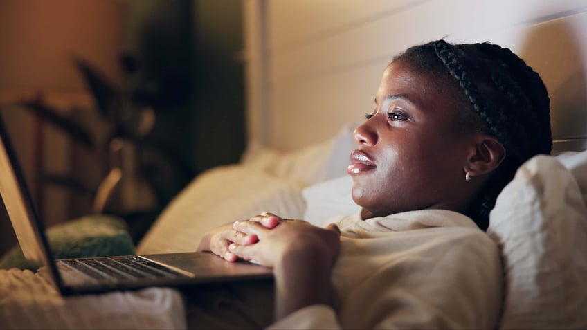 Woman sad laptop