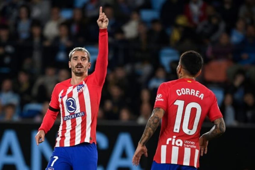 griezmann treble against celta takes atletico second