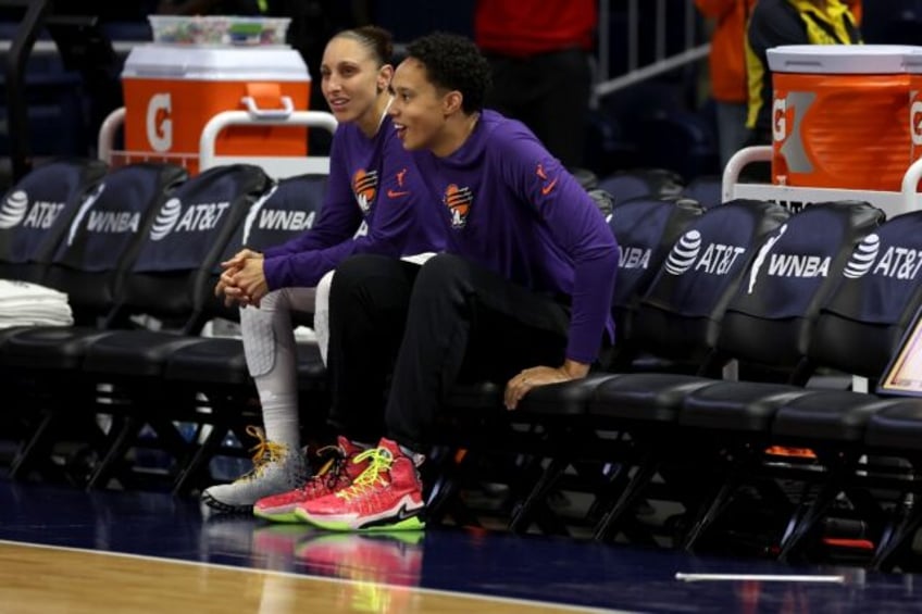 Five-time Olympic champion Diana Taurasi, left, was among those chosen for a US women's basketball roster to compete in Belgium next week but Brittney Griner, who took part in a training camp this weekend, was not named to the American squad for the Olympic tuneup