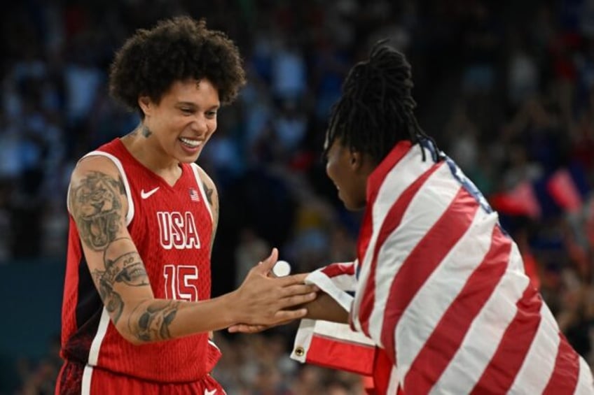 Brittney Griner celebrates after helping the USA win Olympic women's basketball gold