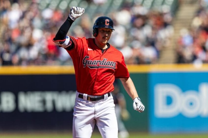 Cleveland's Kyle Manzardo celebrates a home run that helped the Guardians beat Minnesota t