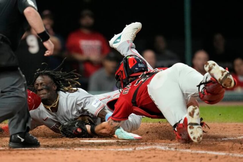 guardians give manager terry francona win in final home game 4 3 to damage reds slim playoff hopes