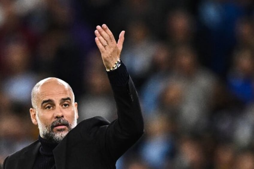 guardiola guards against complacency after man citys perfect start