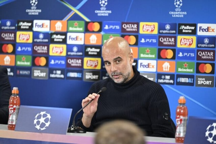 Pep Guardiola speaks to the media ahead of Manchester City's Champions League match at Slo